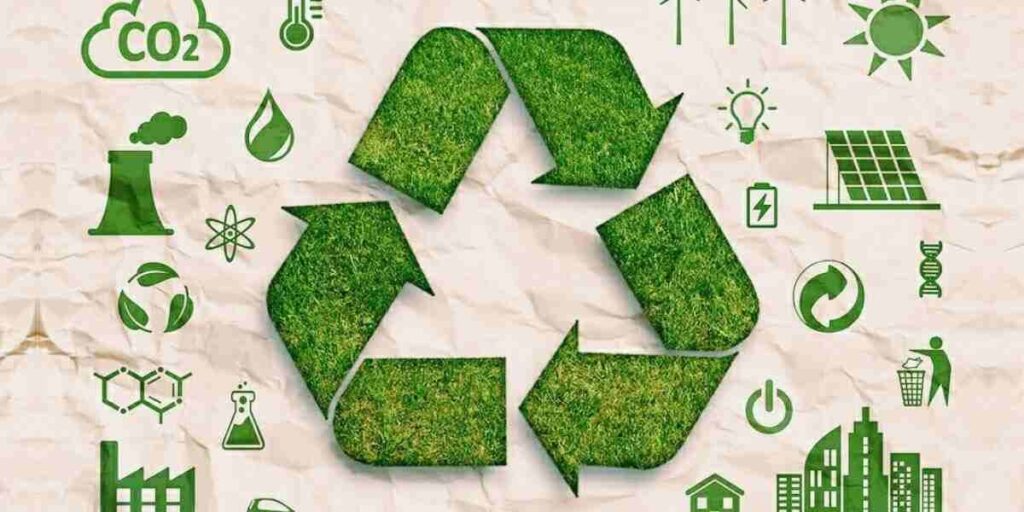 Green recycling symbol made of grass on a textured background, surrounded by various sustainability icons.