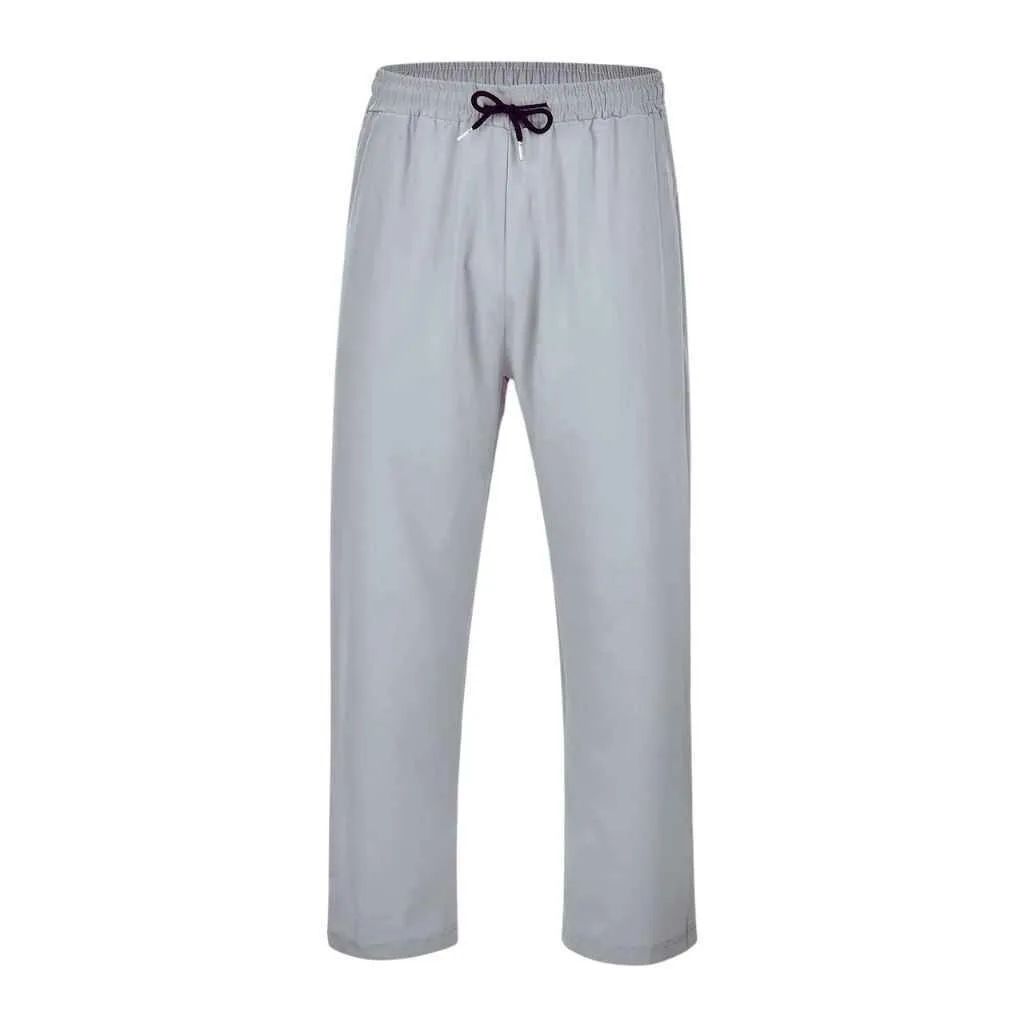 Light grey baggy joggers for men featuring a comfortable elastic waistband and adjustable drawstring.