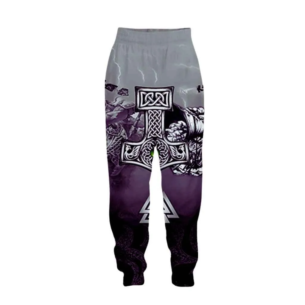 Unique printed joggers for men featuring intricate designs with a Viking motif in shades of grey and purple.