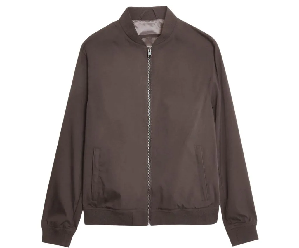 Trendy Brown Bomber Jacket for Effortless Style and Comfort Brown bomber jacket with a zippered front and ribbed cuffs.