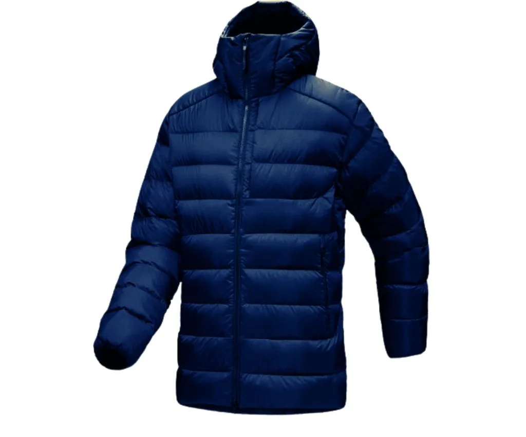 Stylish navy blue down jacket for ultimate warmth and comfort during cold weather. Navy blue down jacket with a hood and zip closure, designed for warmth and comfort.