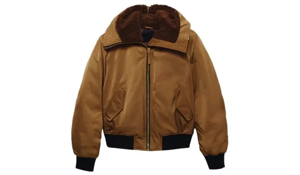 Comfortable Brown Fleece Jacket for Warmth and Style Brown fleece jacket with a zip front, plush collar, and two side pockets, shown against a white background.