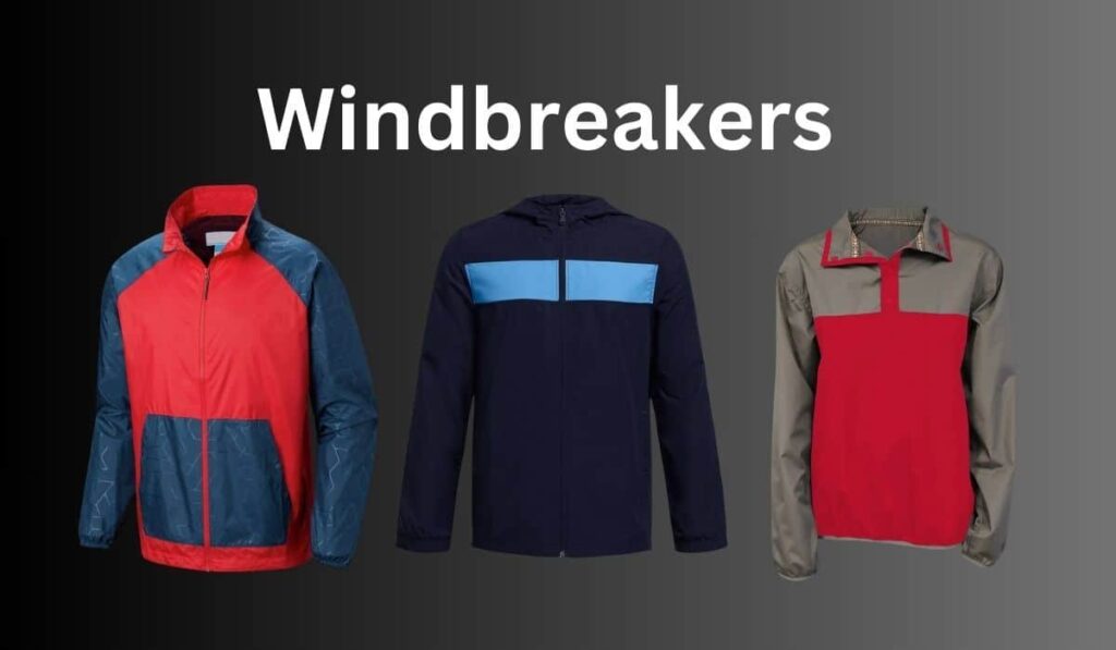 Three stylish windbreakers in red, navy blue, and gray displayed on a gradient background.