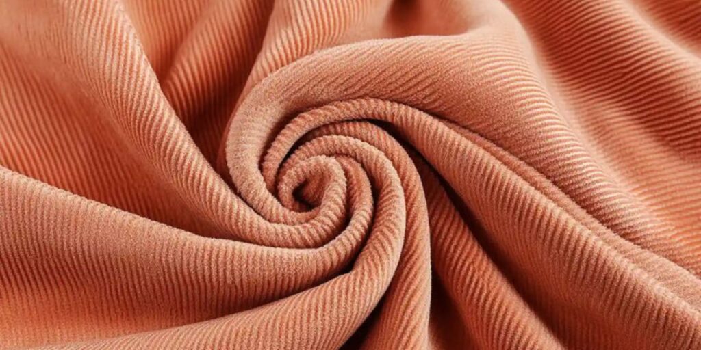 The most distinguishable characteristics of corduroy fabric are its lavish texture, along with its soft to touch feel.