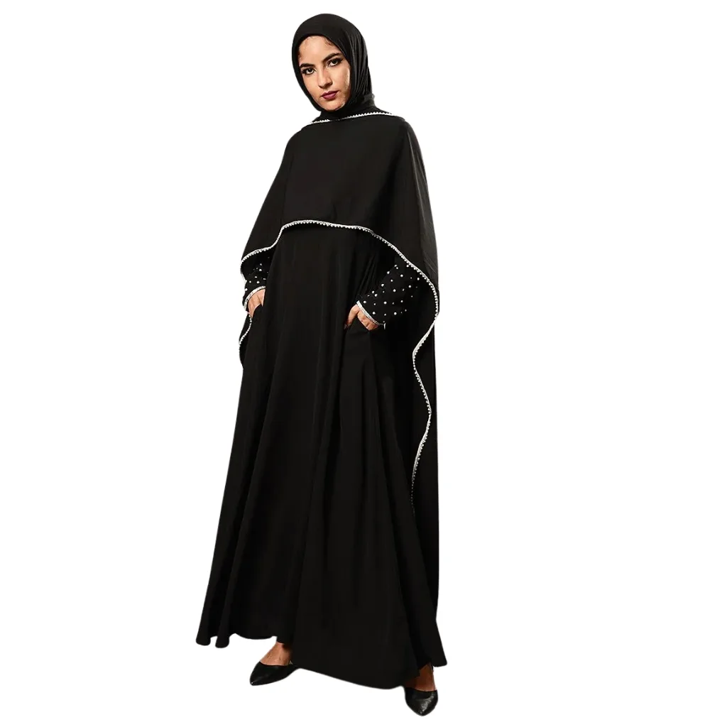 "Elegant cape abaya featuring a flowing cape design, intricate embroidery, and a flattering silhouette, ideal for formal occasions."