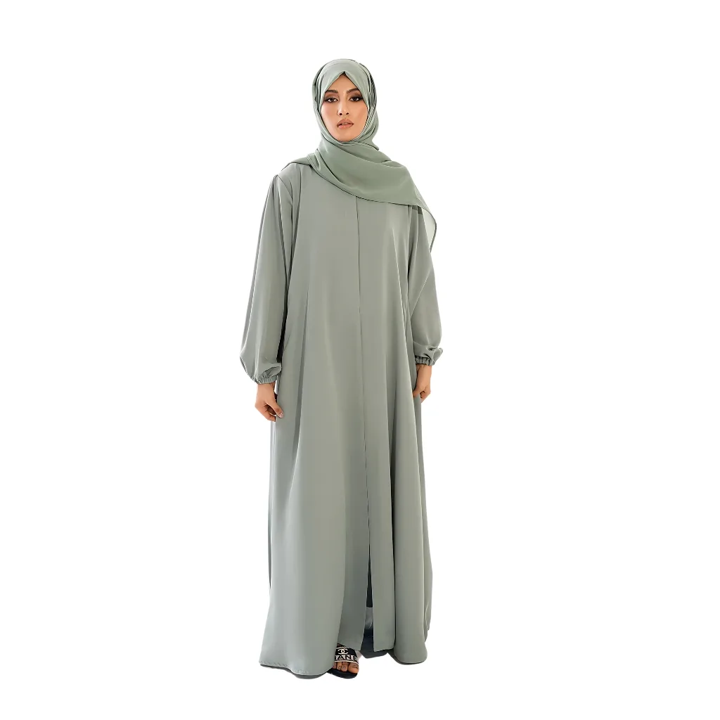 An open-front abaya elegantly draped over a mannequin, showcasing its flowing silhouette, soft fabric, and simple, chic design.