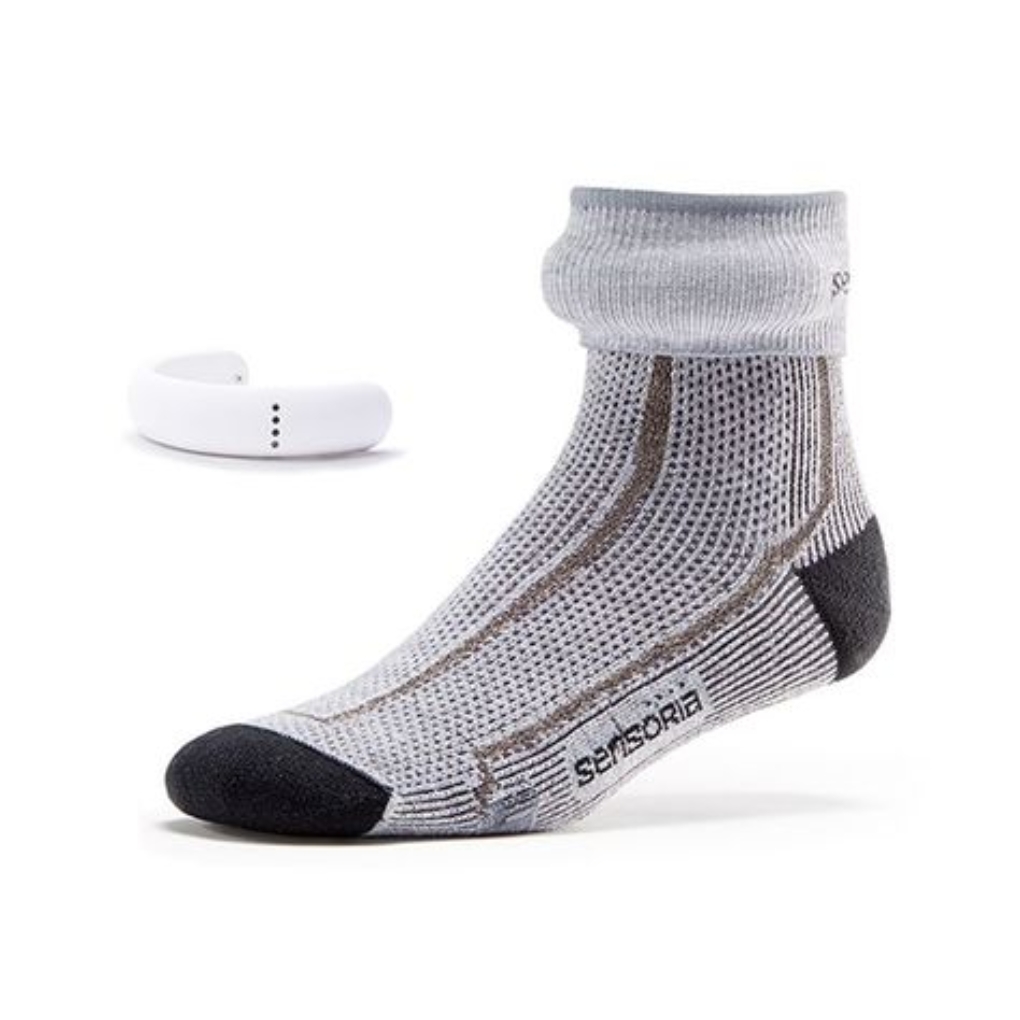 A gray smart sock with a textured design and a white fitness tracker placed beside it.
smart sports wear
