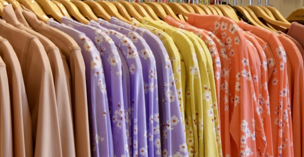 "A colorful chiffon dress hanging on a rack, displaying soft wrinkles typical of the fabric." Feel free to adjust any part to fit your needs!