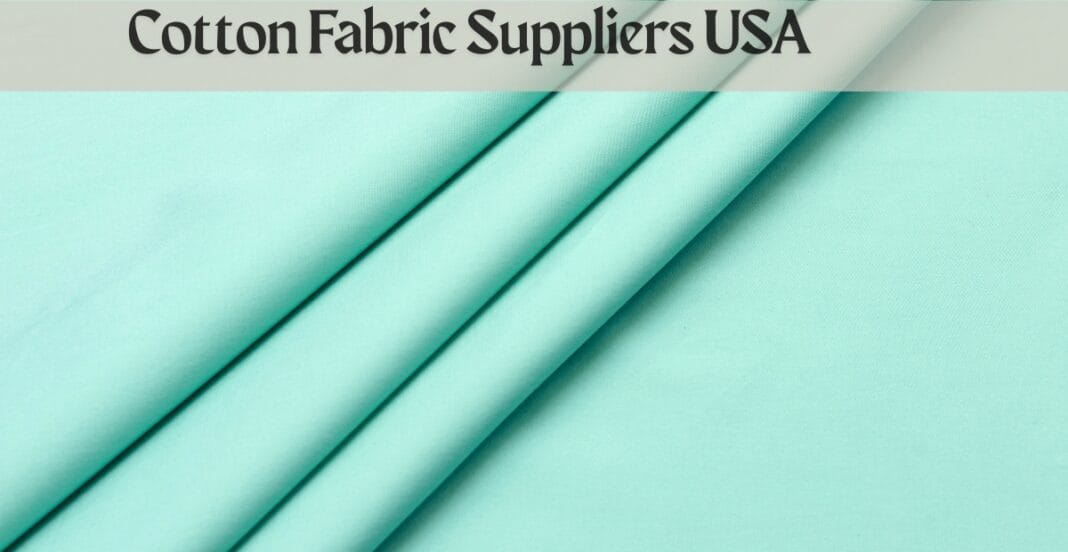 Light mint green cotton fabric with folds, labeled 