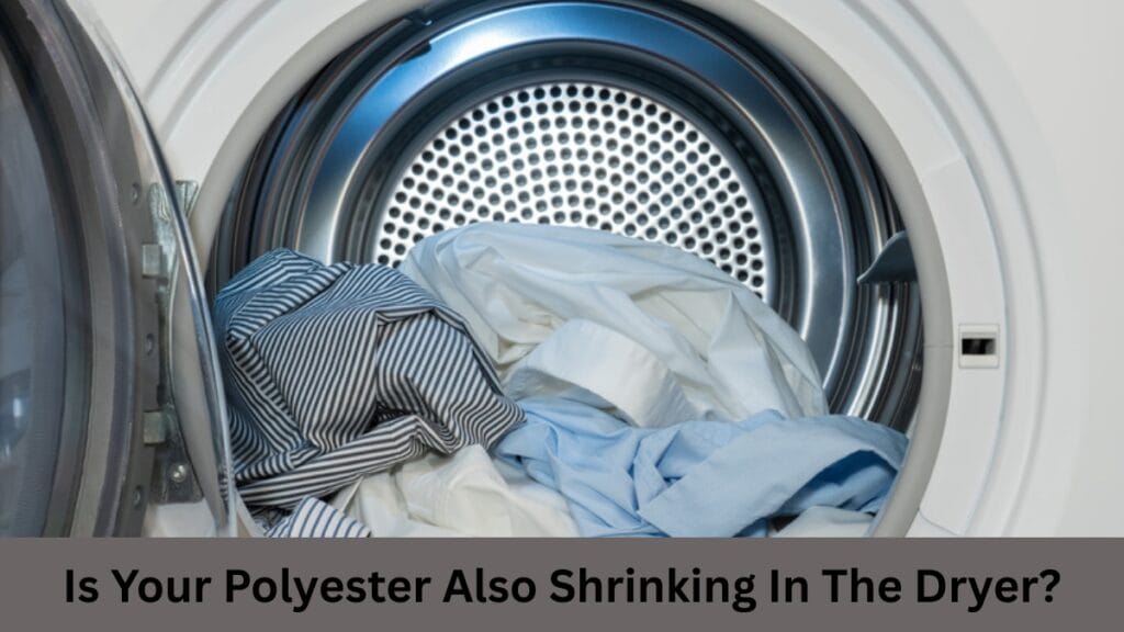 A front-loading dryer with its door open, showing crumpled clothes inside (white, light blue, and striped black-and-white shirts). The caption reads: “Is Your Polyester Also Shrinking In The Dryer?”