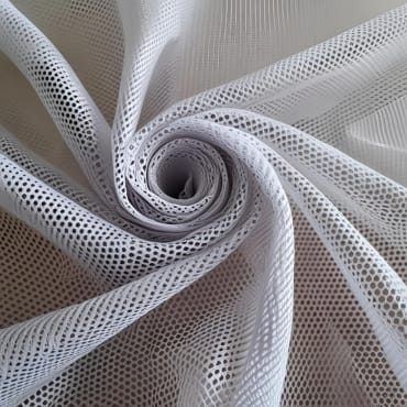 White, lightweight polyester mesh fabric with a grid-like, perforated pattern, arranged in a spiral.