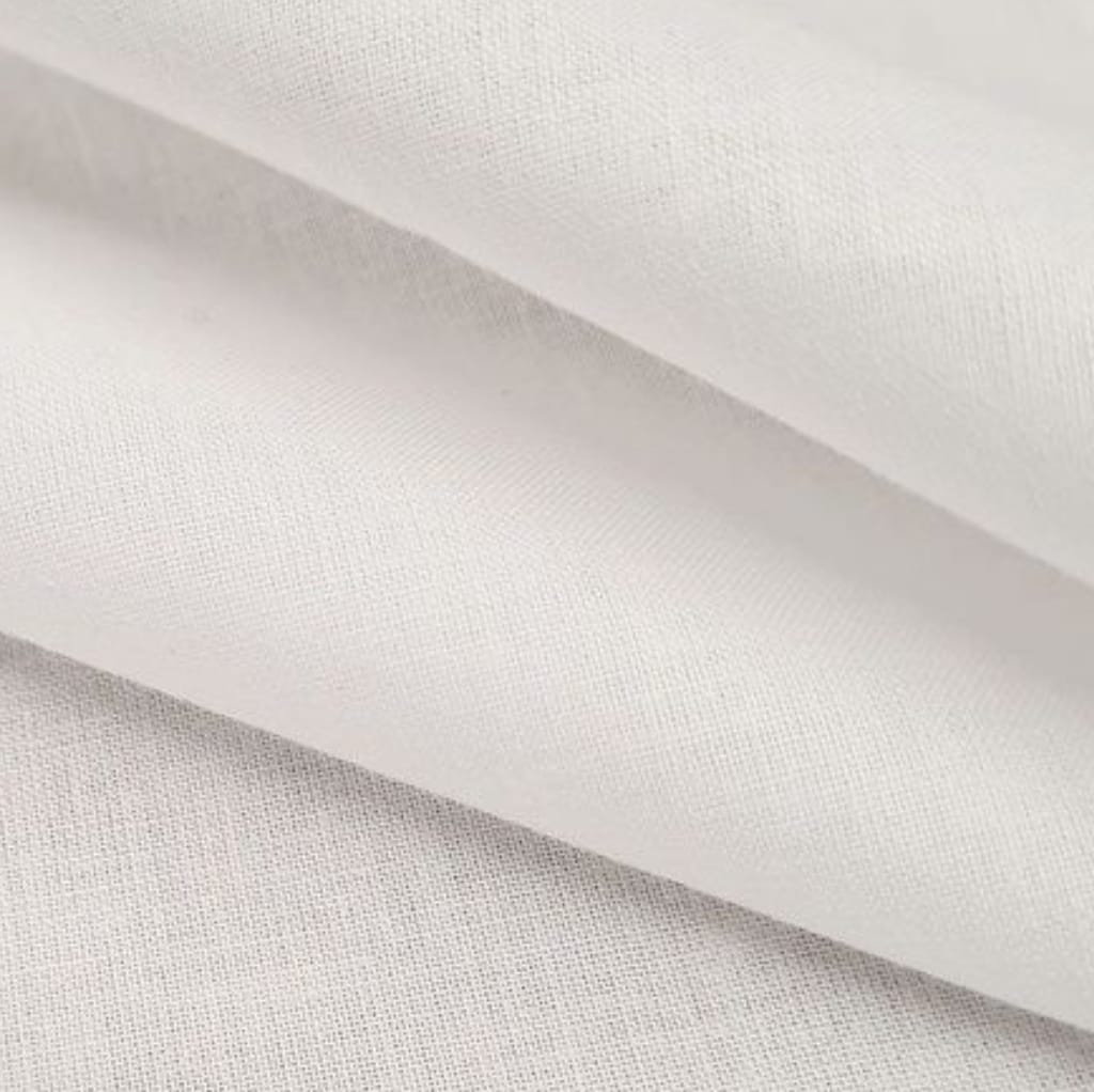 Close-up image of plain weave cotton fabric showing a tight, uniform weave pattern in a white color.
