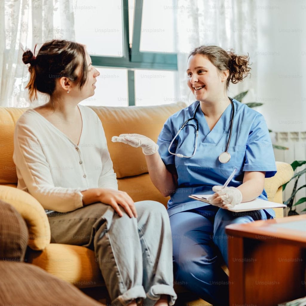 Nurse consulting a patient at home — Write for Us on Health