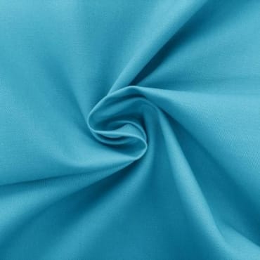 A close-up of light blue polyester jersey fabric, gently twisted to show its smooth texture and slight sheen.