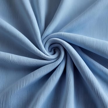 Close-up image of a light blue polyester knit fabric, showing its textured, ribbed surface with a spiral fold.