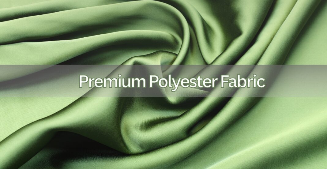 Close-up of luxurious, smooth green satin-like polyester fabric with a shiny finish and elegant drape.