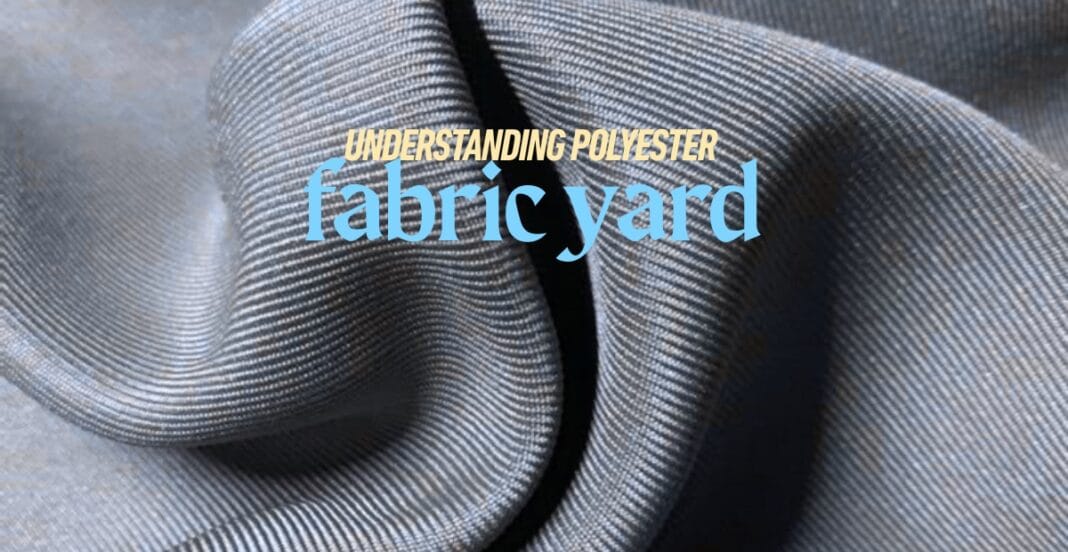 Close-up of a shiny, smooth polyester fabric with text overlay that reads 
