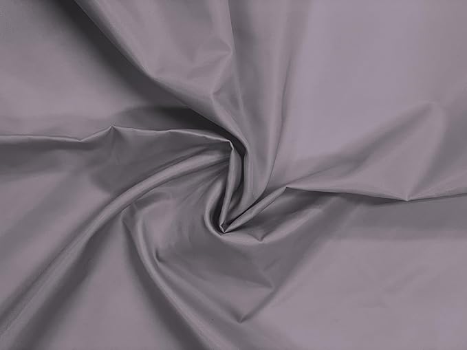 Close-up of twisted gray fabric with a smooth, slightly shiny texture.