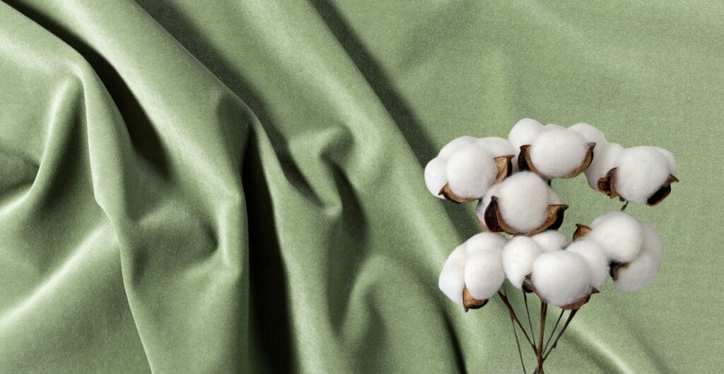 Close-up of woven cotton fabric showing its texture and weave pattern.