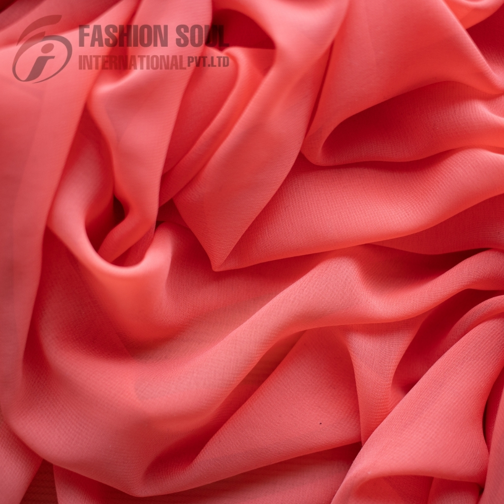 Close-up of soft pink fabric with smooth, flowing folds.