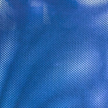 Close-up image of bright blue Powernet spandex fabric with a textured, mesh-like surface and small perforations.
