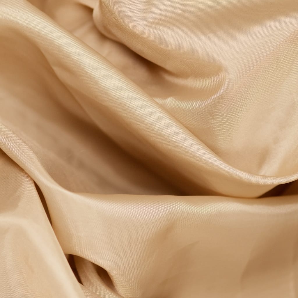 A detailed close-up of Sea Island cotton fabric showcasing its silky smooth texture and fine weave.