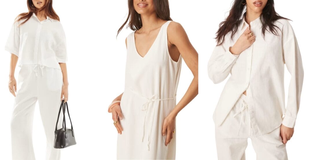 Three women wearing white or off-white loungewear or casual clothing, with the first holding a black handbag, the second with a waist-tie dress, and the third in a button-up shirt and matching trousers.