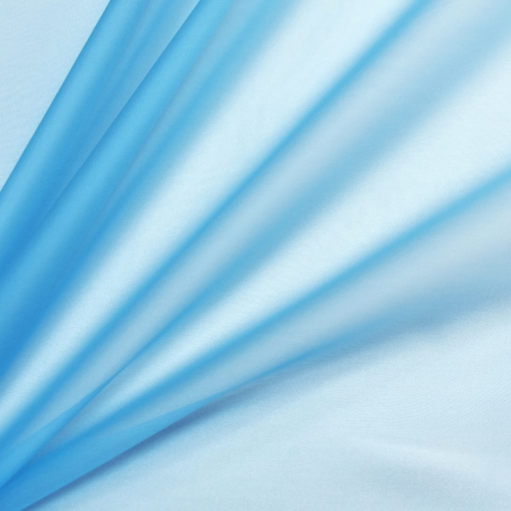 Close-up of light blue silk organza fabric with soft folds and a smooth, semi-translucent surface.