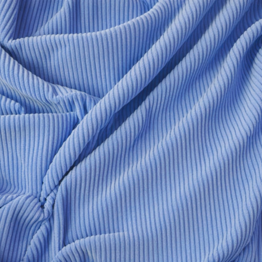 Close-up of light blue corduroy fabric showing its distinctive ridges and soft texture.