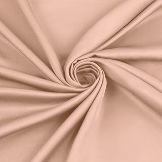 Close-up of light brown or beige fabric twisted into a spiral pattern.