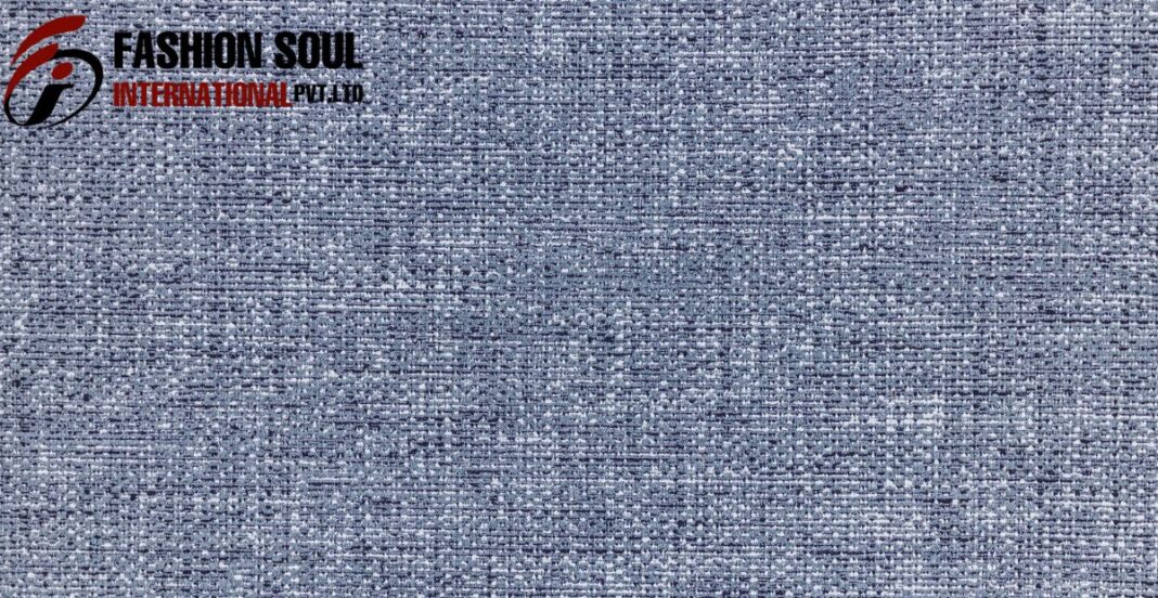 Close-up of breathable eco chambray texture with natural dye finish