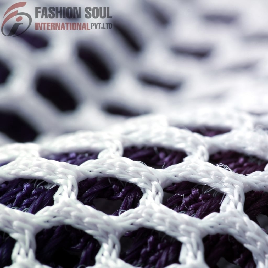 Close-up of a woven netted fabric with purple and white threads forming a grid pattern.