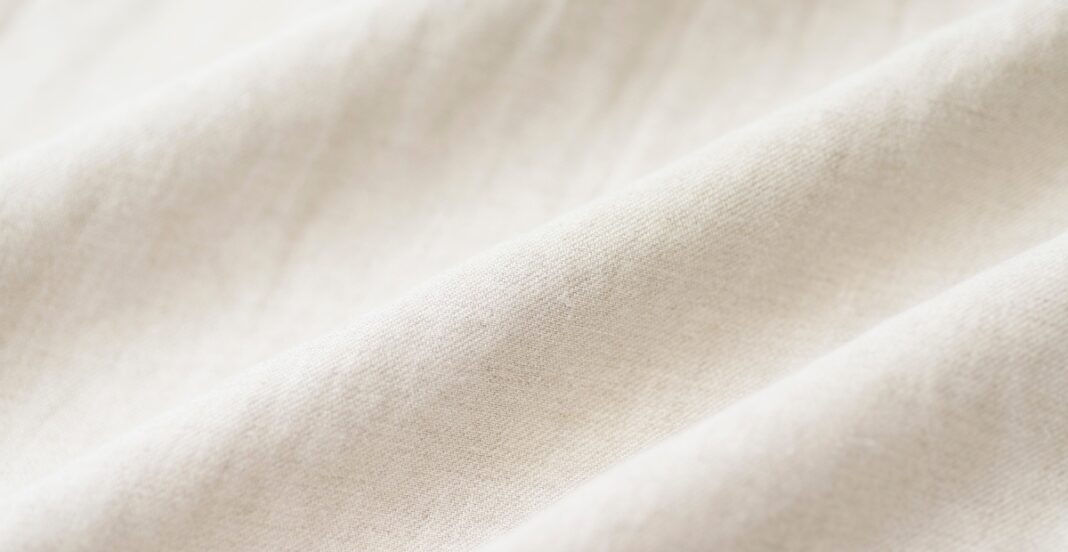 Sheer linen fabric material, lightweight and elegant, perfect for summer fashion.