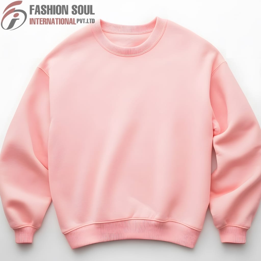 Light pink sweatshirt with a crew neckline laid flat on a white surface, with the brand logo "Fashion Soul International" in the top left corner.