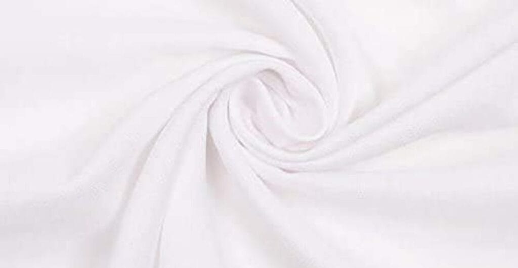 Close-up of white fabric twisted into a spiral pattern, showing smooth texture and slight stretch.
