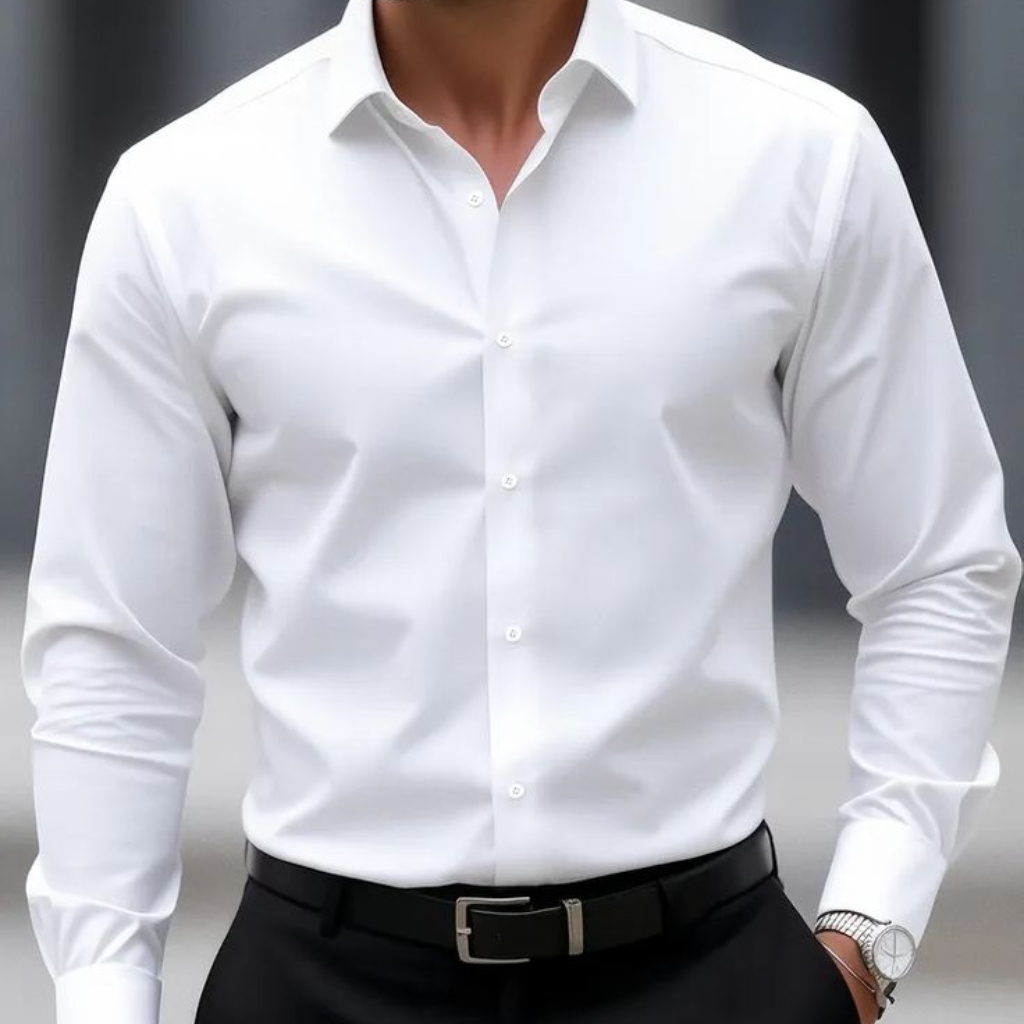 A person wearing a classic white long-sleeve button-up shirt, with a collar, tucked into black trousers, and accessorized with a watch on the left wrist.