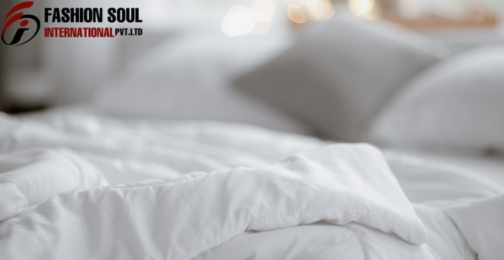 A neatly made bed with white pillows and bedding, with a blurred background and a logo in the upper left corner reading "Fashion Soul International Pvt. Ltd."