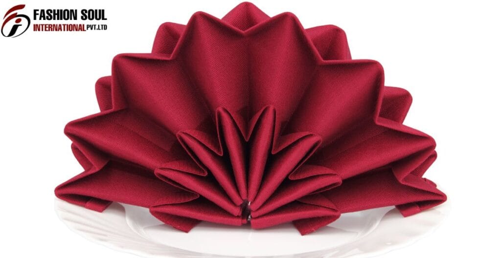 polyester-napkins-for-wedding Elegant wedding table setting featuring folded polyester and linen napkins side by side for comparison.