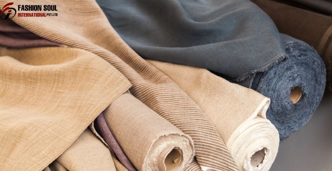 Natural fiber clothing displayed on a rack in a minimalist boutique