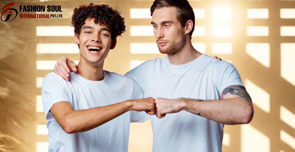 Two young men engaging in a friendly fist bump, smiling and showing camaraderie inside a well-lit room.