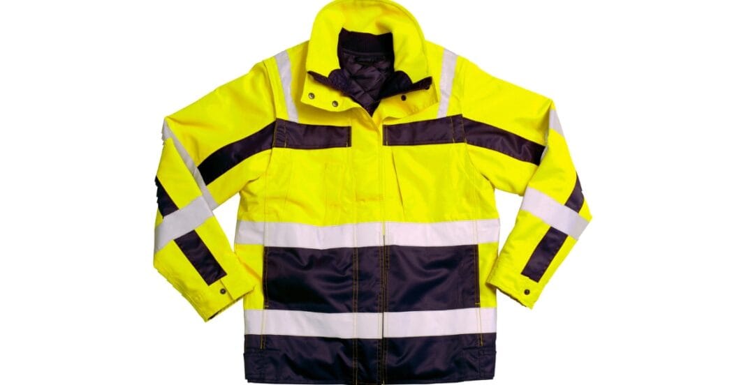 A high-visibility yellow and black safety jacket with reflective stripes, laid flat against a white background.