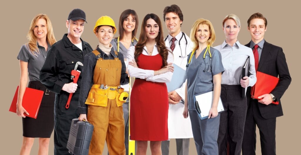 A diverse group of employees wearing well-fitted, branded uniforms smiling and collaborating in a bright workplace, illustrating benefits such as professional appearance, brand consistency, and team unity.