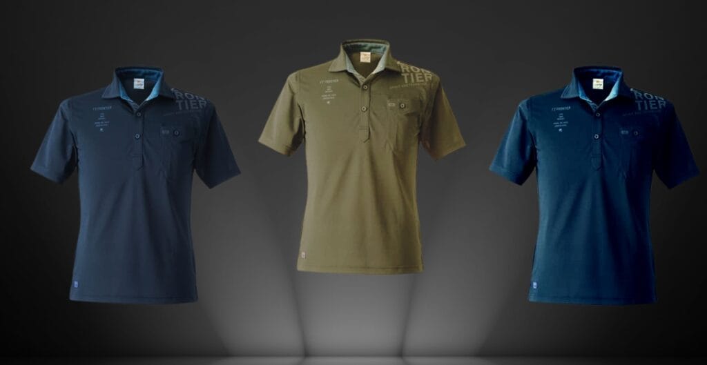 A sharp, well-fitted man wearing a crisp short-sleeve work shirt, paired with dress pants and a belt, standing confidently in a modern office setting.