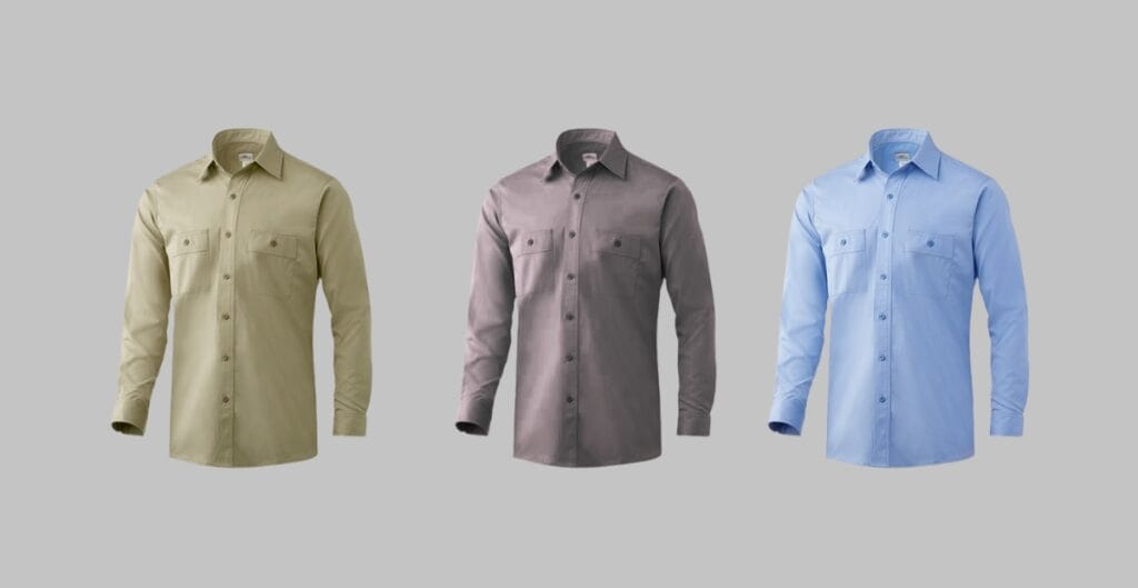 A row of neatly pressed professional dress shirts in white, light blue, and charcoal hanging on wooden hangers in a tidy office wardrobe.