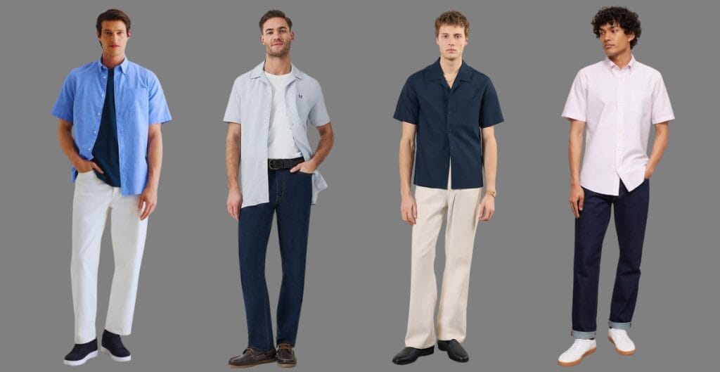 A stylish man in a modern, slim-fit short sleeve work shirt paired with tailored trousers and a minimalist belt, standing in a contemporary office space.