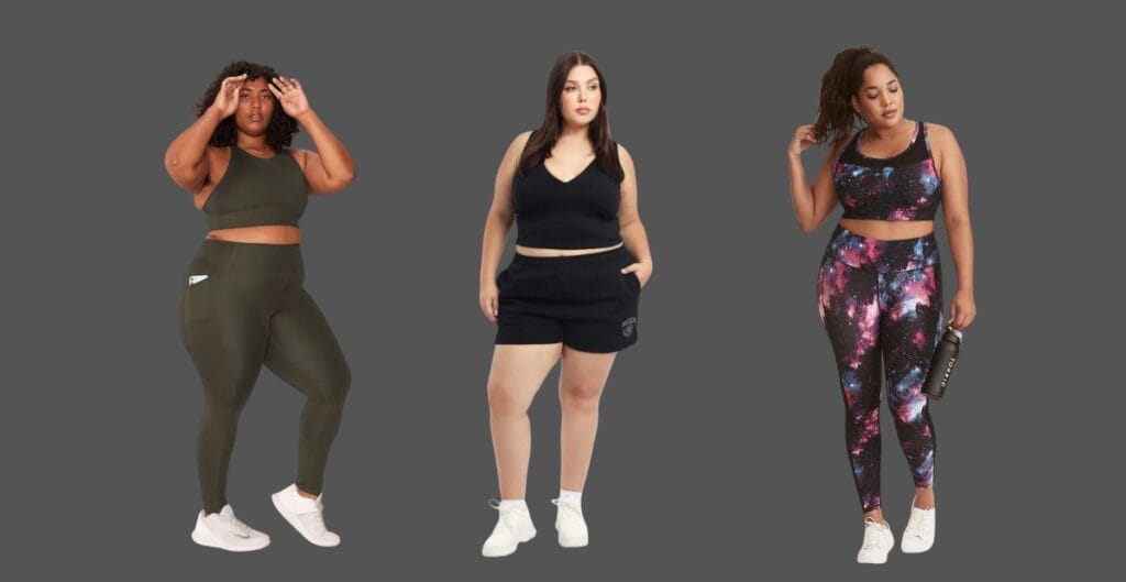 Confident plus-size model wearing a lavender and charcoal color-block activewear set, performing a yoga pose on a sunlit studio floor.