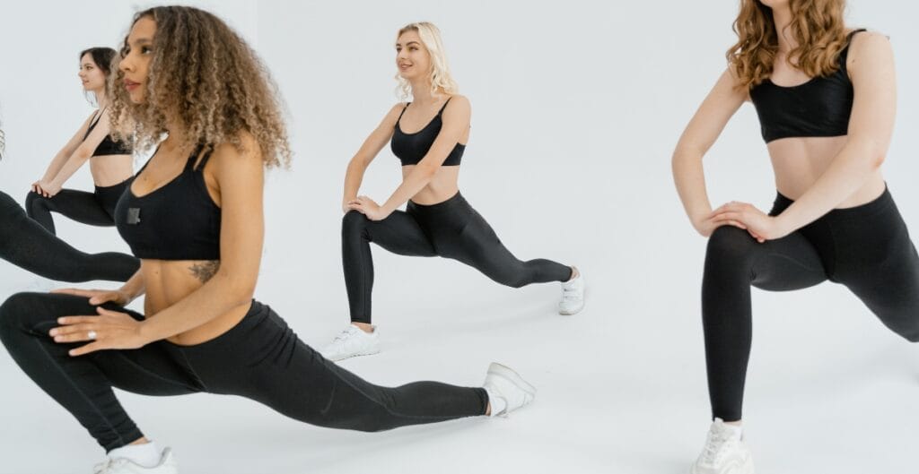 Woman in workout leggings performing leg press at a gym.