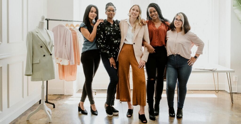 A diverse group of women showcasing trendy and cute fashion dresses in different styles and colors