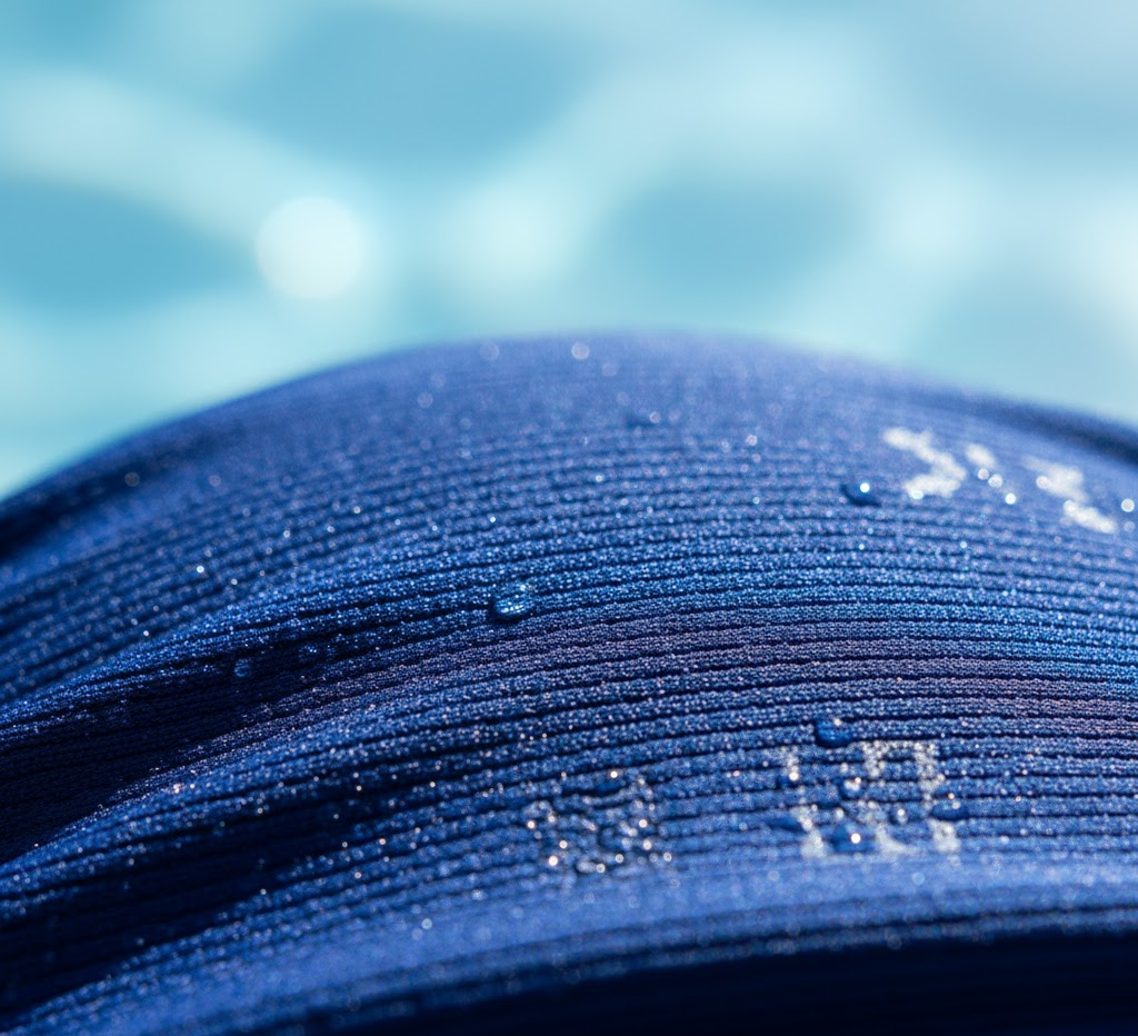 Detailed view of chlorine-resistant fabric showcasing its texture and stretch.