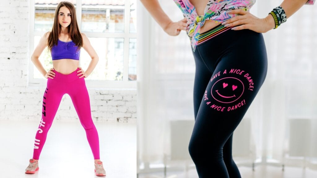 Woman in bright pink logo leggings, standing in a fitness studio, showcasing activewear fashion